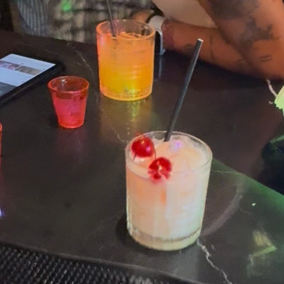Happy hour cocktails and shots on the bar